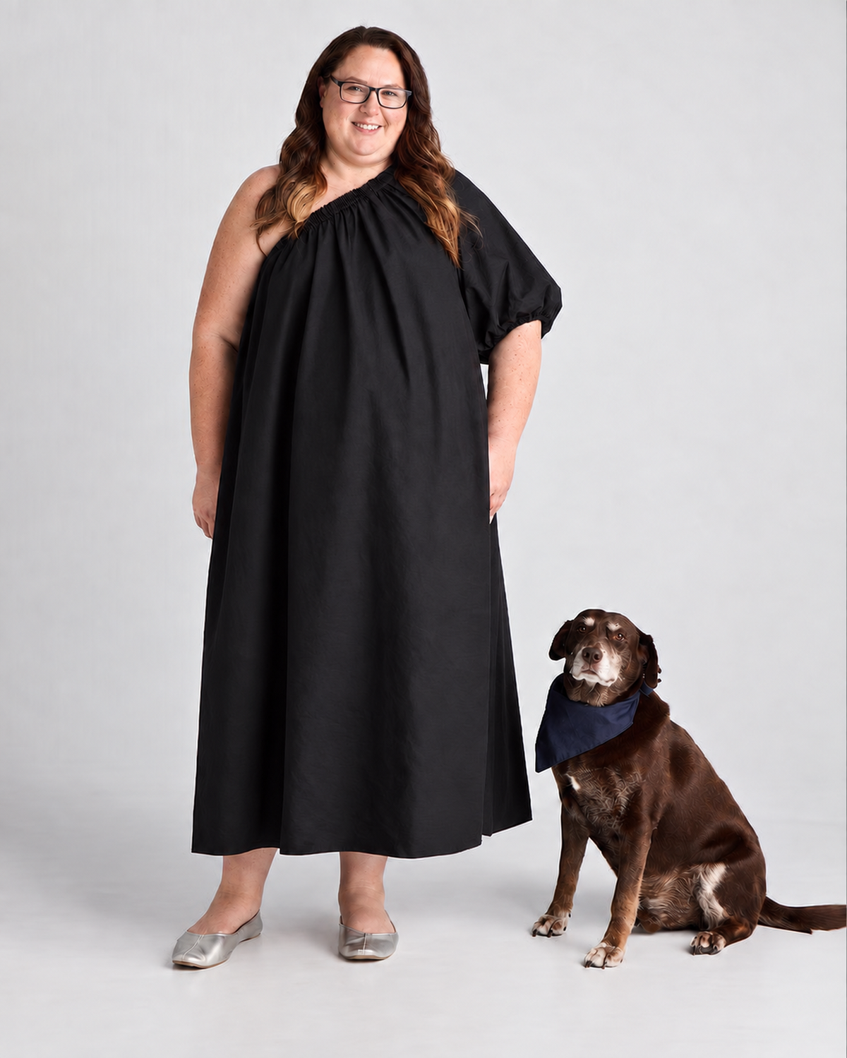 Philippa in a black dress with Shadow